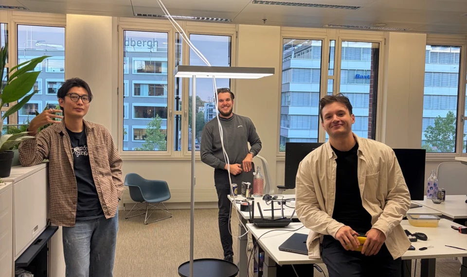 Members of the Theseus Robotics team in their workspace